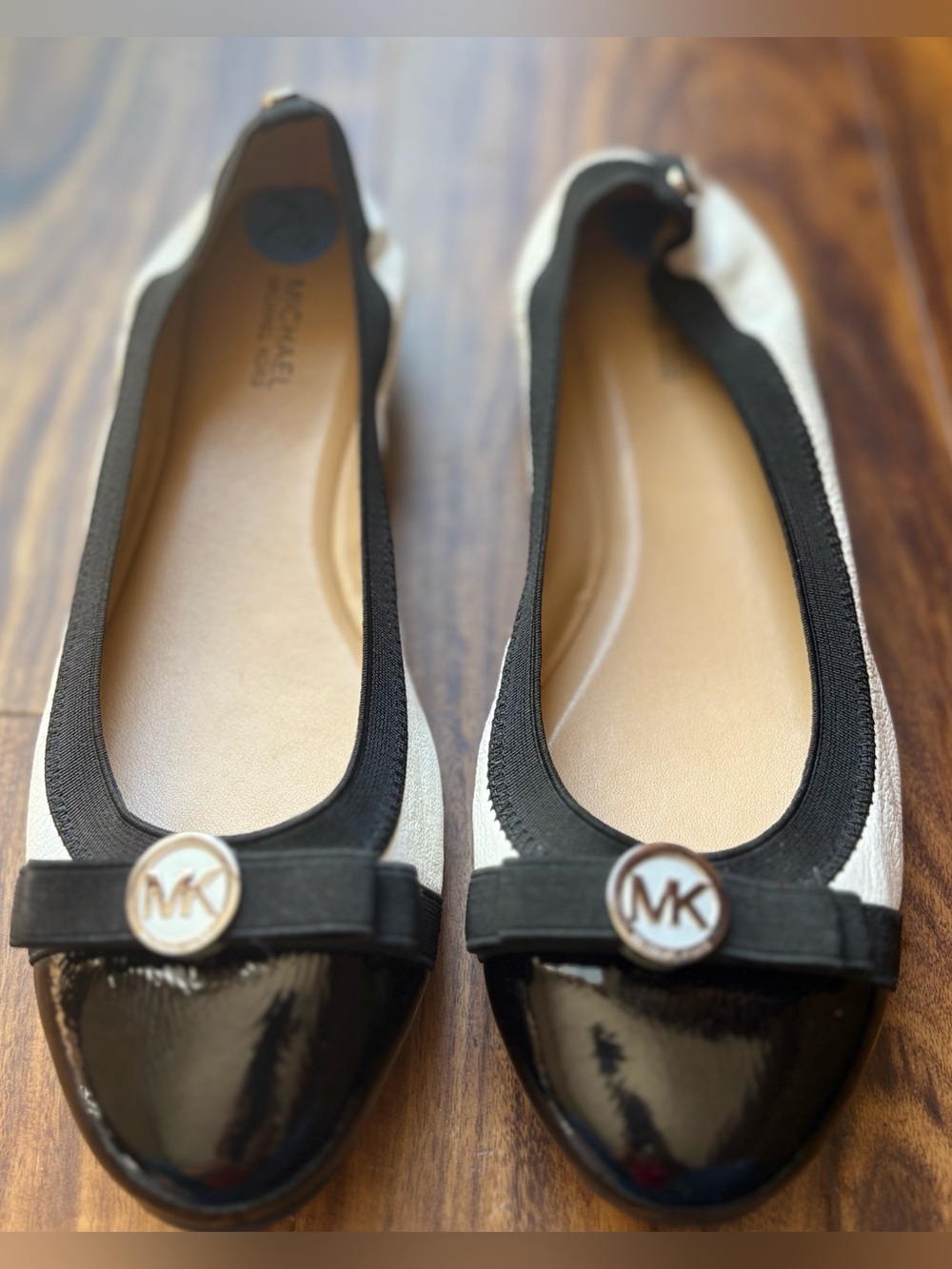 Michael Kors Black and white cap-toe with MK logo bow Leather Ballet Flats 7.5